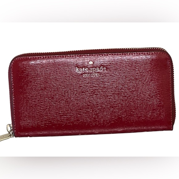 kate spade Handbags - NWT Kate Spade Cedar Street Patent Lacey wallet.